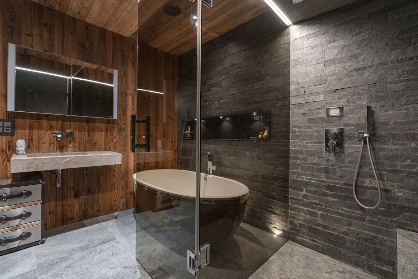 Spa bathroom with freestanding bath and hammam shower, holiday apartment in Villars
