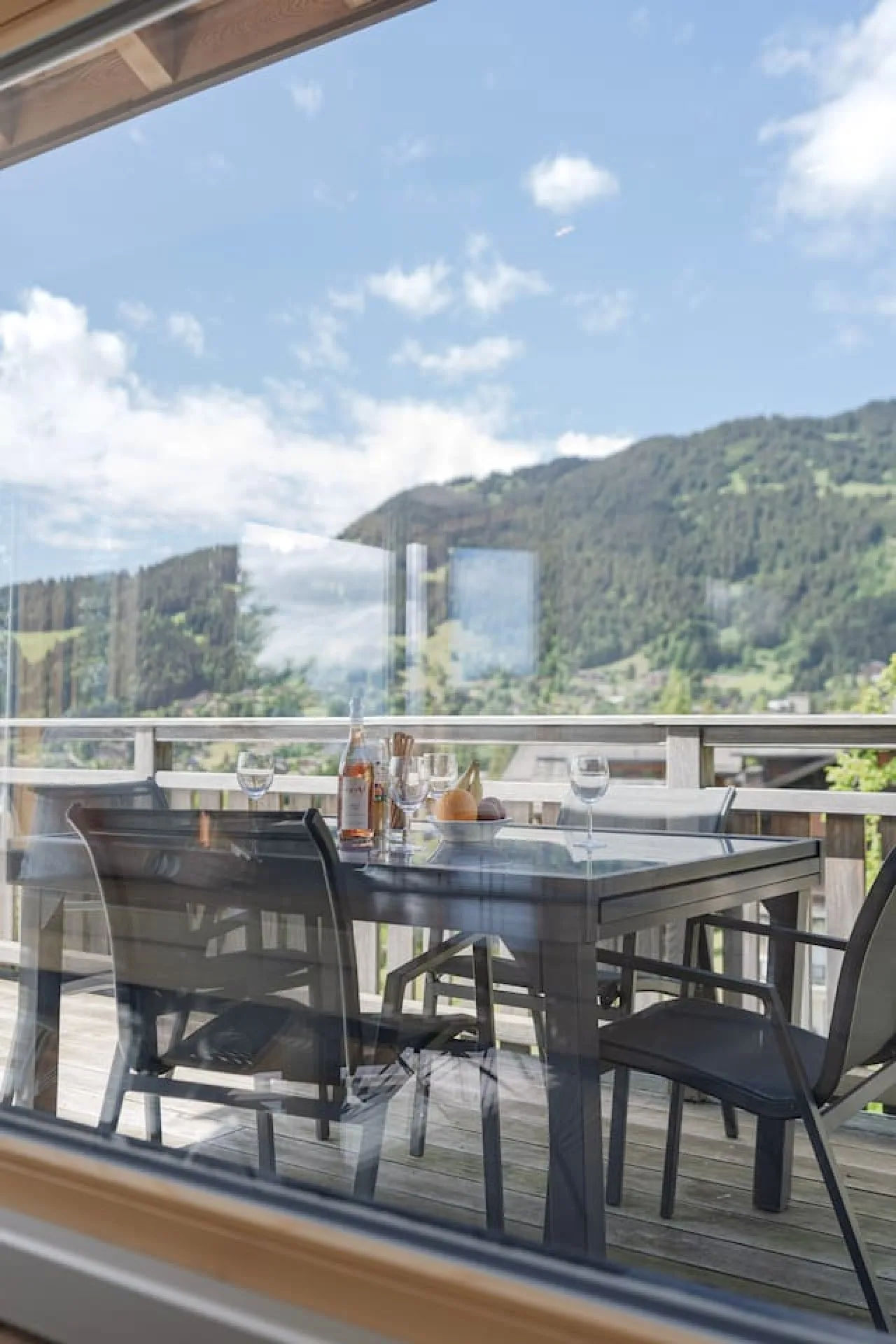 View from the balcony over the valley and the mountains of Villars-sur-Ollon