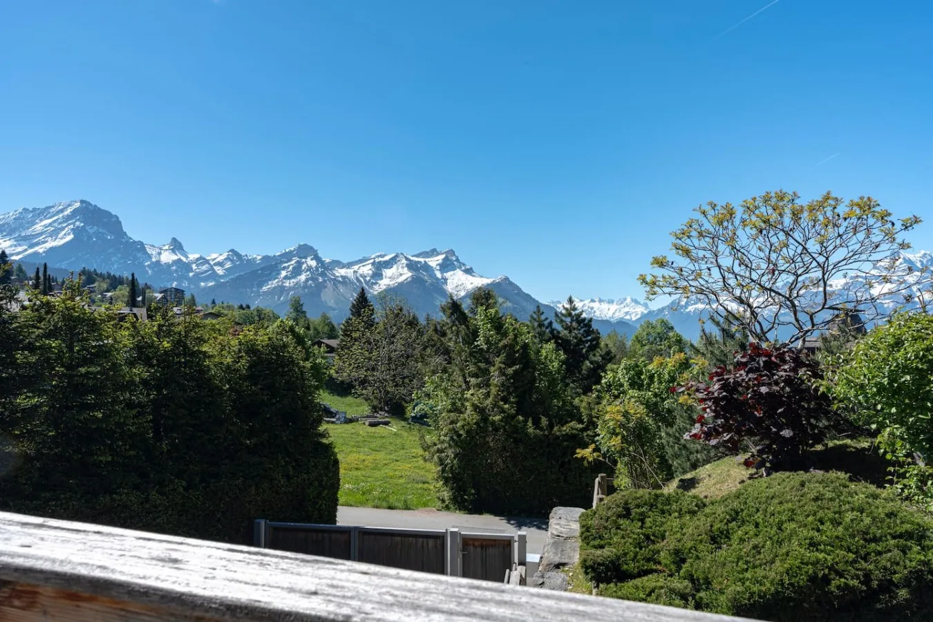 Open view of the Alps from the family chalet in Villars-sur-Ollon in summer