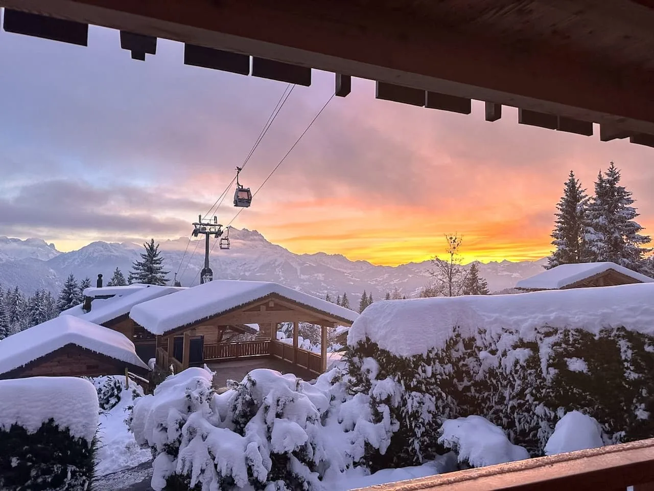 Sunset over the gondola cabins from the apartment, Villars