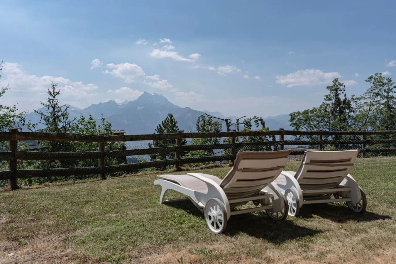 Sun loungers in the private garden facing the Alps, holiday apartment in Villars