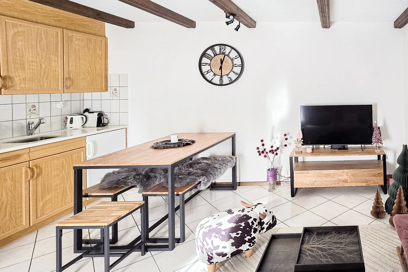 Cuisine et coin repas d'un appartement en gestion locative