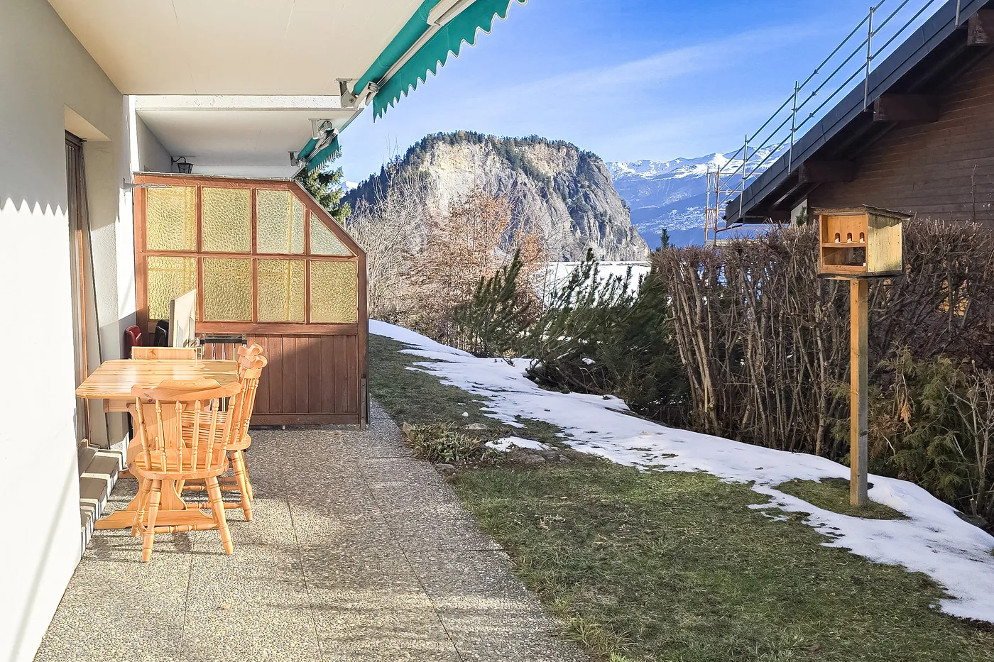 Terrasse avec vue sur les montagnes d'un appartement en gestion locative