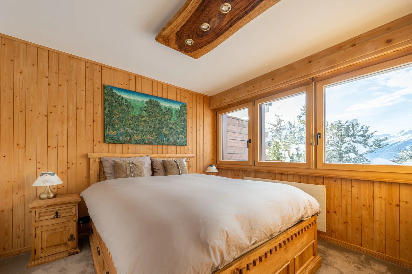 Chambre avec boiseries d'un chalet en gestion locative à Verbier